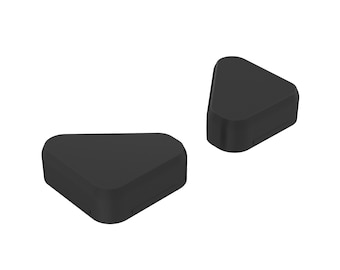 May include: Two black triangular-shaped boxes. The boxes are made of a smooth, hard plastic.