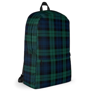 May include: A green and blue plaid backpack with a black zipper and adjustable straps.