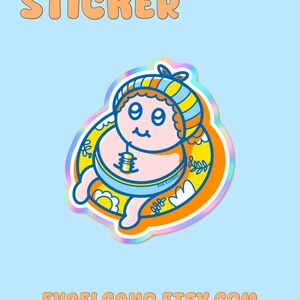 May include: Holographic sticker featuring a cartoon baby in a blue and orange striped hat and a yellow floatie. The sticker has the word "STICKER" in orange bubble letters at the top and the Etsy shop URL "EVAELCANO.ETSY.COM" at the bottom.