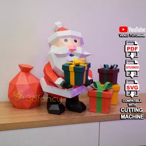 Babbo Natale di carta che fa regali PDF, modello SVG, fantastici lavoretti fai da te per decorazioni natalizie, modello di Natale 3D di carta low poly