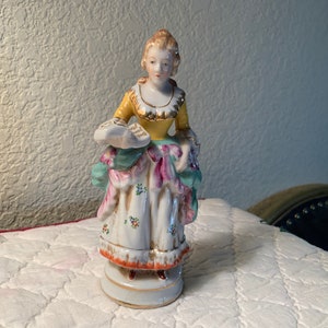 1940s Made in Occupied Japan Glazed Porcelain Victorian Woman Holding a Book Figurine