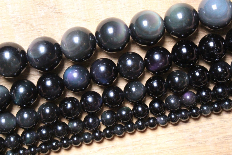 Obsidian pearls celestial eye 90 natural pearls of 4mm 6mm(x63) Obsidian pearls celestial eye 90 natural pearls of 4mm 6mm(x63)