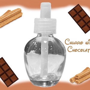 May include: A clear glass bottle with a white pump top and a white dropper. The bottle is filled with a clear liquid. The bottle is surrounded by images of chocolate bars and churros. The text "Churro with Chocolate" is written in black on a white background.