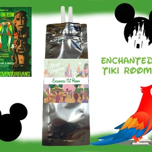 May include: A silver pouch with a colorful illustration of the Enchanted Tiki Room at Walt Disney World. The pouch has a white label with the text "Magic Kingdom" and "Enchanted Tiki Room".