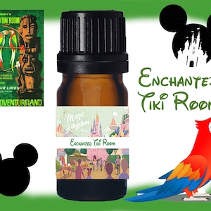 May include: A small brown glass bottle with a black cap and a white label. The label has a picture of the Enchanted Tiki Room at Walt Disney World and the text "Magic Kingdom" and "Enchanted Tiki Room".
