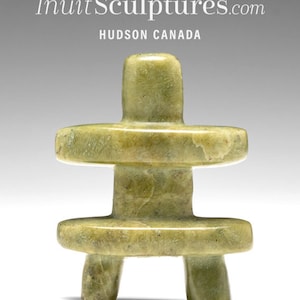 May include: A green stone sculpture of a person sitting on a stool. The sculpture is made of a smooth, polished stone and has a simple, abstract design.