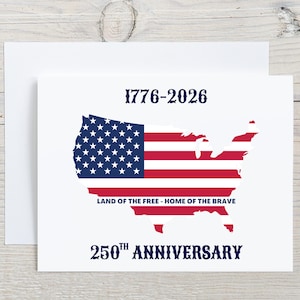 May include: White greeting card featuring a map of the United States with the American flag design. The card includes the text "1776-2026", "Land of the Free - Home of the Brave", and "250th Anniversary" in navy blue.