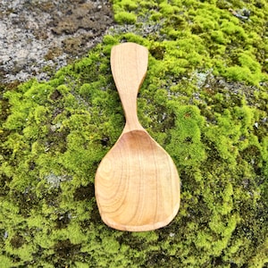 Hand carved eating spoon