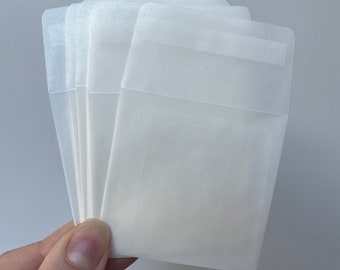 Set of 25, 50 or 100 Glassine envelope peel & seal with flap. Perfect for DIY Wax melts, seeds, wedding favour, mini confetti bags 65 x 65mm