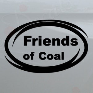May include: A white truck with a black oval sticker that says "Friends of Coal" on the back.