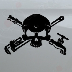 May include: Black and white decal of a skull with crossed wrenches and a faucet. The decal is on the back of a white pickup truck.