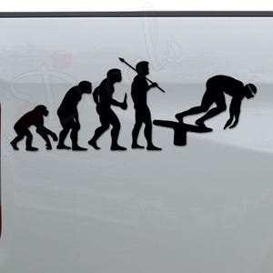 May include: Black vinyl decal depicting the evolution of a diver, from ape to diver on a diving board. The decal is applied to the side of a white vehicle, near the taillight.