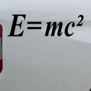 May include: A white pickup truck with a black vinyl decal of the famous physics equation "E=mc²" on the back.