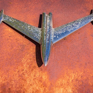 Chrome Jet Airplane Hood Ornament On A Rusty Classic 1956 Oldsmobile In Old Car City Georgia - Fine Art Photography Prints, Canvas, Metal