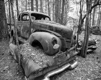 Two Vintage Classic Cars Stacked Upon Each Other In A Rural Georgia Junkyard Named Old Car City - Fine Art Photography Prints, Canvas, Metal