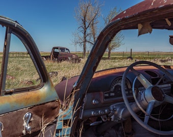 Looking Through An Abandoned Car At A Rusty Vintage Antique Chevy Pickup Truck In A Rural Field - Fine Art Photography Prints, Canvas, Metal