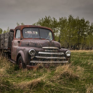 Rusty Antique Abandoned Classic Dodge Farm Truck Resting In An Overgrown Field In Rural Canada Fine Art Photography Prints, Canvas, Metal image 1