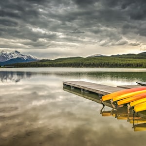 Red And Orange Canoes at Maligne Lake With The Canadian Rockies In Jasper National Park Alberta - Fine Art Photography Prints, Canvas, Metal