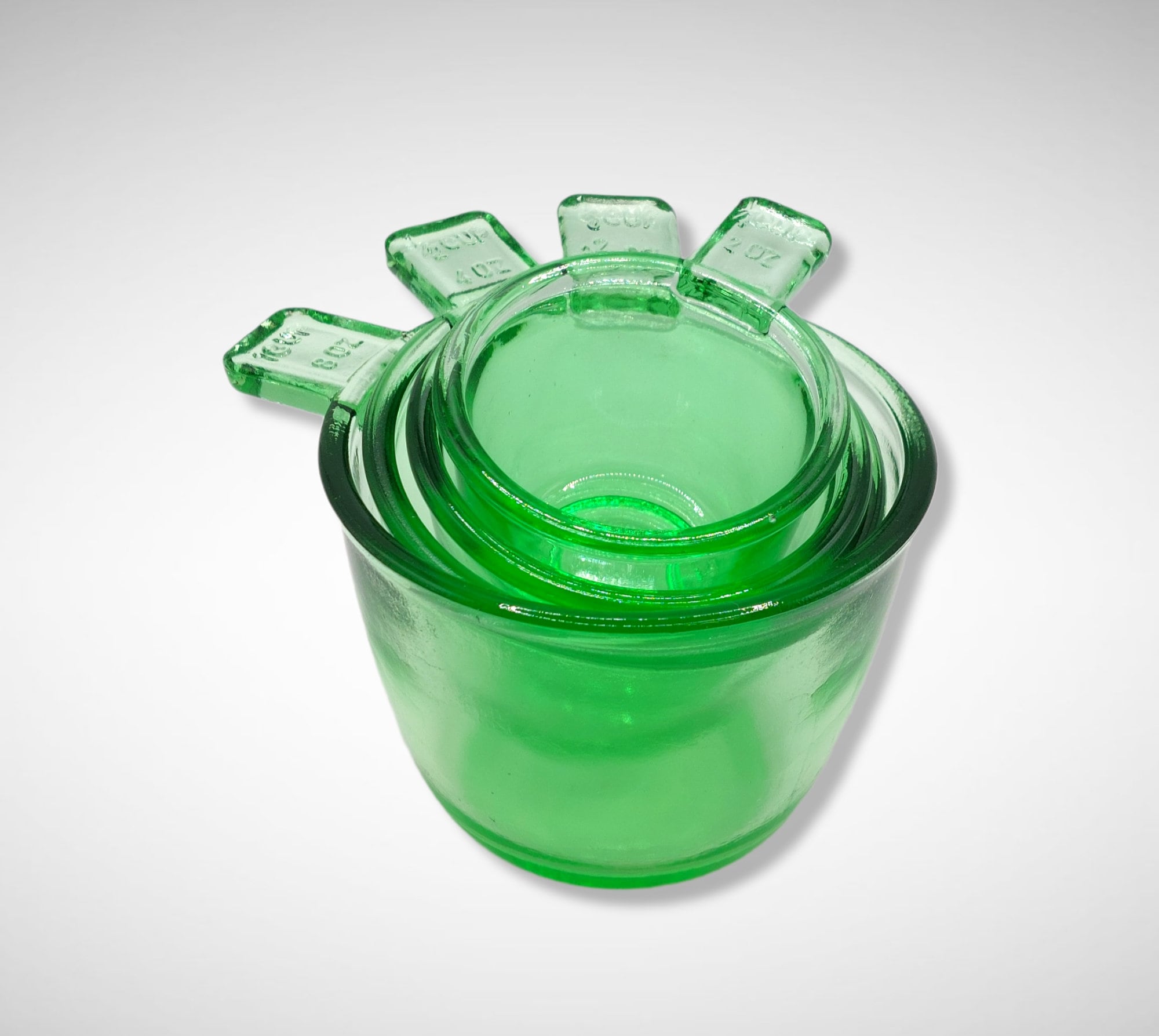 Green Depression Style Glass 4 PC Nesting Measuring Cup Set W