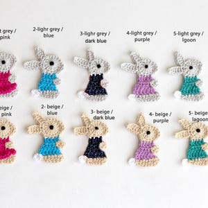 May include: Crocheted bunny appliques in various colors, including light grey, beige, hot pink, blue, dark blue, purple, and lagoon. Each bunny has a different colored dress. Text on the image indicates color combinations.
