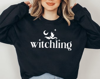 Sudadera bordada del Trono de Cristal: Manon Pico Negro Witchling - Licencia oficial