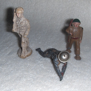 Vintage Metal Toy Soldiers and One Wood Toy Soldier