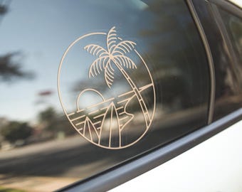 Calcomanía de vinilo con atardecer en la playa: ideal para coche, portátil o surf.