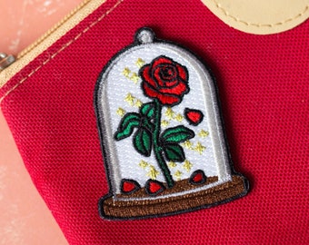 Rose under glass bell iron-on patch