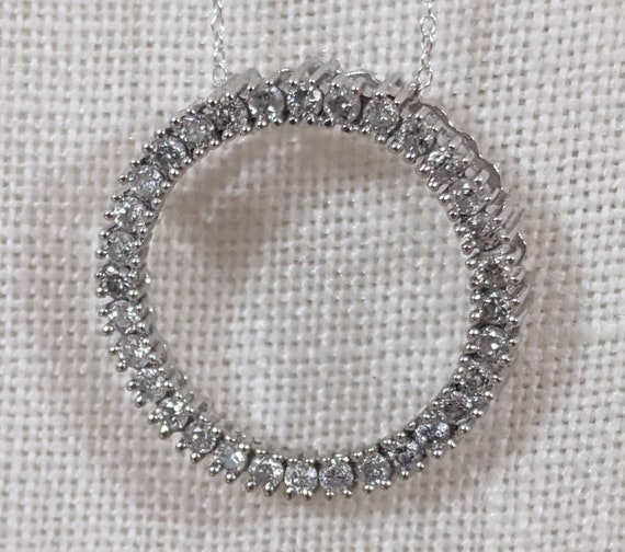 14kt gold and .75ct white diamond circle pendant - image 4