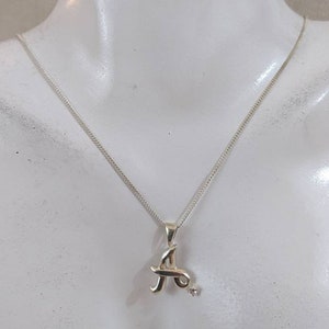 Role a maré! Um colar perfeito com pingente de prata esterlina e CZ Alabama