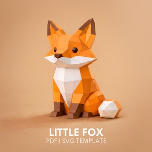 May include: A low-poly papercraft fox figurine featuring orange, white, and brown geometric facets. The fox is in a seated position with a white-tipped tail. Below the fox, the text reads LITTLE FOX PDF | SVG TEMPLATE in white letters.
