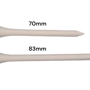 May include: Two wooden golf tees, one 2.75 inches long and the other 3.25 inches long, are displayed against a white background. The tees have a natural wood color and a pointed end.