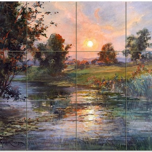 May include: A watercolor painting of a sunset over a lake. The sun is setting behind a line of trees and houses, casting a warm glow on the water. There are reeds and lily pads in the foreground.