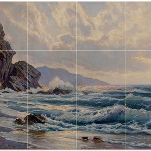 May include: A painting of a rocky coastline with crashing waves and a cloudy sky. The water is a deep blue and the sky is a light blue with white clouds. The rocks are a dark brown and the sand is a light brown.