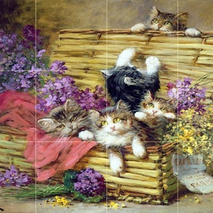 May include: A painting of four kittens playing in a wicker basket filled with purple and yellow flowers. The kittens are all different colors and have playful expressions on their faces. The basket is sitting on a red cloth and there is a newspaper with the word "EXPRESS" visible in the background.