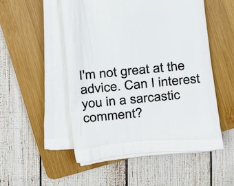 May include: White kitchen towel with black text that reads "I'm not great at the advice. Can I interest you in a sarcastic comment?"