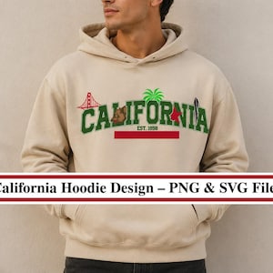 Puede incluir: Sudadera con capucha beige con un diseño gráfico verde y marrón de los monumentos de California, incluyendo el Golden Gate Bridge, un oso y una palmera. La palabra "CALIFORNIA" está en verde, con "EST. 1858" debajo. Una franja horizontal roja en la parte inferior.