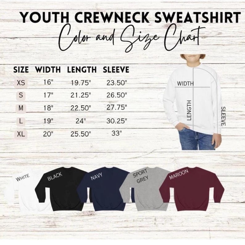 May include: A youth crewneck sweatshirt color and size chart. The chart shows measurements in inches for sizes XS to XL. The image also displays a white sweatshirt and examples of black, navy, sport grey, and maroon sweatshirts.