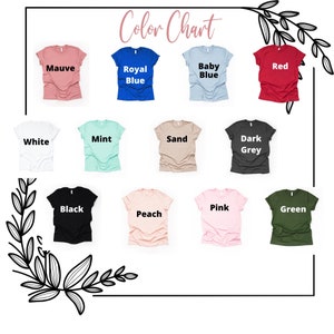 May include: Color chart showing 12 different t-shirt colors: mauve, royal blue, baby blue, red, white, mint, sand, dark grey, black, peach, pink, and green.