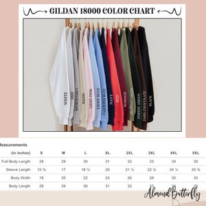 May include: A color chart for Gildan 18000 sweatshirts, showcasing various colors like white, ash, and navy. Measurements in inches are provided for different sizes, including full body length, sleeve length, body width, and body length.