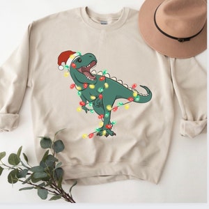 Christmas Dinosaur Sweatshirt, Cute Dinosaur Sweaters, Dinosaur Holiday Sweater, Christmas tshirt, Hoodie, Womens Christmas Crewneck, T Rex