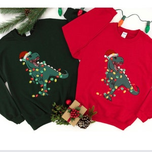 Christmas Dinosaur Sweatshirt, Cute Dinosaur Sweaters, Dinosaur Holiday Sweater, Christmas tshirt, Hoodie, Womens Christmas Crewneck, T Rex