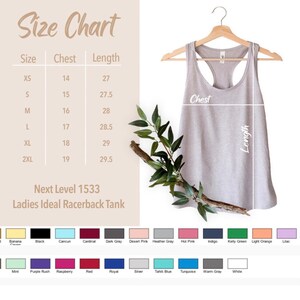 May include: A light gray racerback tank top hanging on a wooden hanger. The image includes a size chart with chest and length measurements in inches, and a color chart with various color options for the tank top. The text reads "Next Level 1533 Ladies Ideal Racerback Tank."