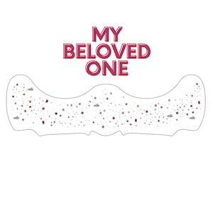 May include: A decorative, curved, clear plastic item with a starry design and the text "MY BELOVED ONE" in red and pink. The design includes stars, dots, and cloud shapes.