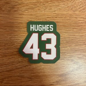 Pegatinas de camisetas de la NHL / Sebastian Aho, Quinn Hughes, Auston Matthews, Sidney Crosby, Brad Marchand, Connor Bedard / Resistentes al agua Q Hughes (Wild)