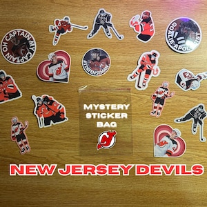 Sac à autocollants mystère Devils du New Jersey | 4 autocollants chacun | Résistant à l'eau | LNH