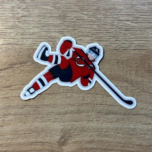 Jack Hughes Falling Sticker | New Jersey Devils | Water Resistant
