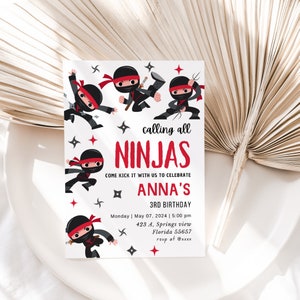 May include: A white invitation featuring black and red ninja characters. The invitation reads "calling all ninjas come kick it with us to celebrate Anna's 3rd birthday" with the date, time, and location.