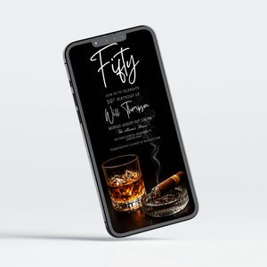 May include: A smartphone displays a black invitation for a 50th birthday celebration. The invitation features white script text that reads "Fifty" and details for Will Thompson's party, including a glass of whiskey with ice and a lit cigar in an ashtray.