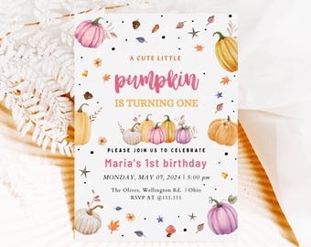 May include: A rectangular invitation card with a watercolor design. The card features pumpkins, leaves, and the text "A CUTE LITTLE pumpkin IS TURNING ONE." It also includes the text "Maria's 1st birthday" and event details.